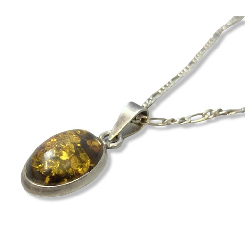 12A - Payne & Sons Silver & Amber pendant & Chain.
Pendant - 3.5cm long