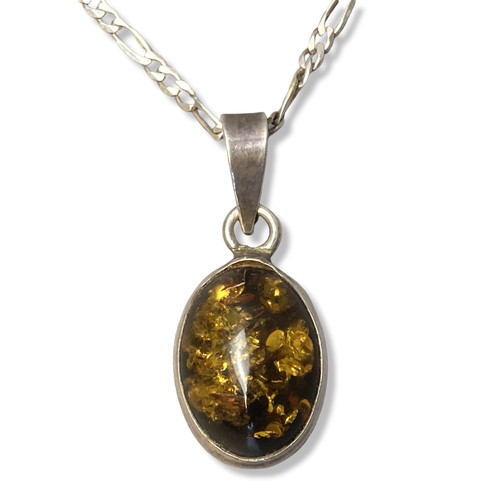 12A - Payne & Sons Silver & Amber pendant & Chain.
Pendant - 3.5cm long