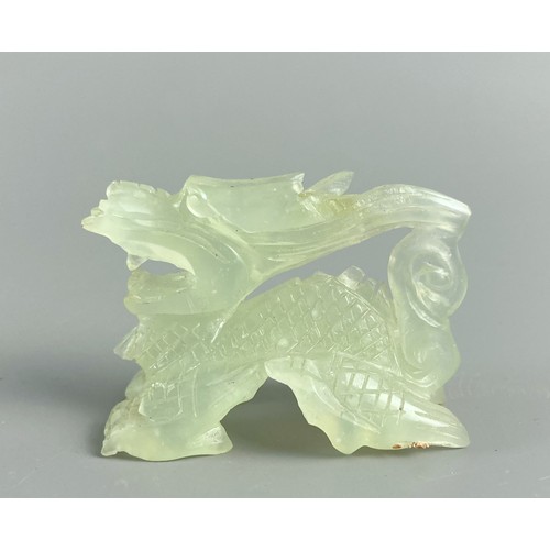 37 - Chinese Nephrite Jade pendant token together with a carved Dragon. 
Token - 6 x 3cm & Dragon 14 x 3.... 