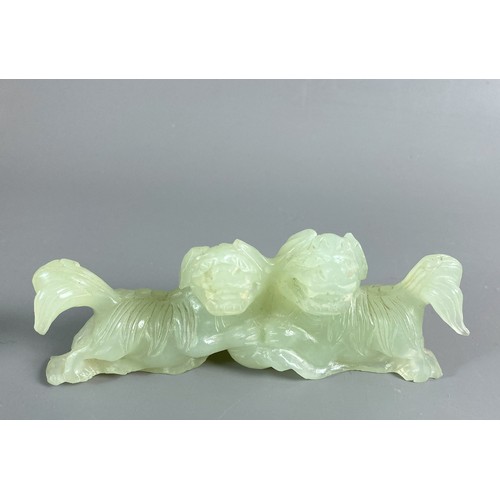 38 - A Chinese carved Nephrite Jade Fo dogs group. 
12 x 4.5cm