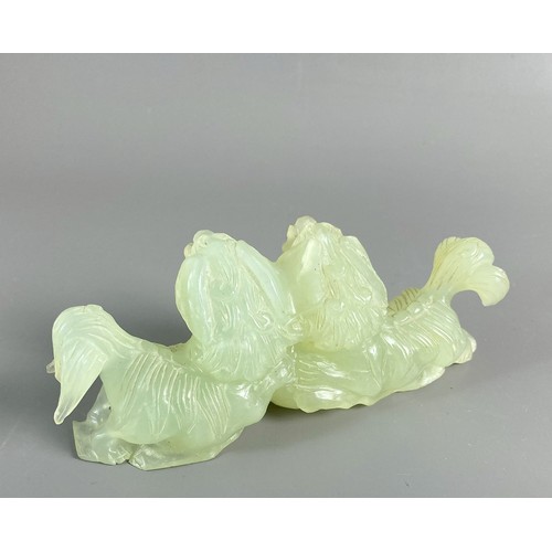 38 - A Chinese carved Nephrite Jade Fo dogs group. 
12 x 4.5cm