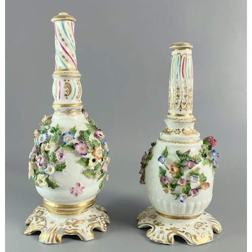 103 - Near pair of Georgian Coalport Coalbrookdale bottle vases. Adorned with hand painted flowers. 
Talle... 