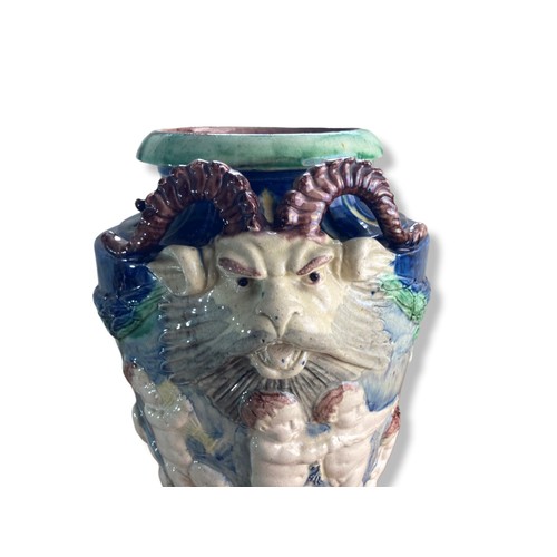 110 - 19th Century Continental Majolica cherub vase. With twin renaissance style handles. Hand-painted rel... 