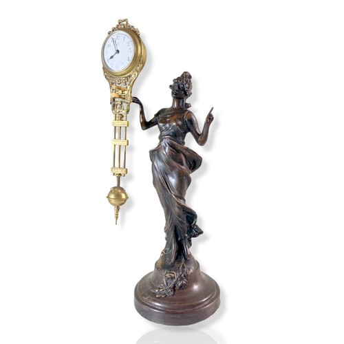 74 - An Early 20th Century Junghan's mystery clock.
34cm tall.