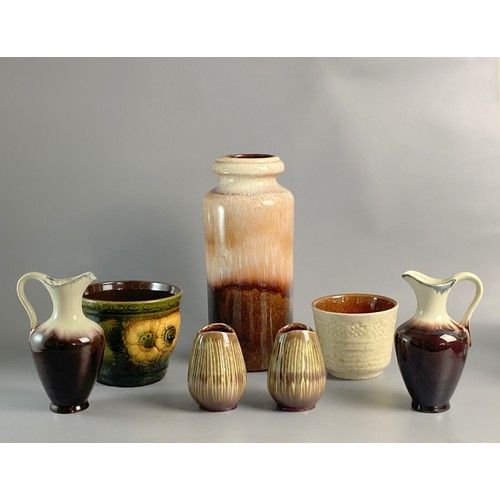 121 - Seven pieces of Retro West German pottery vases planter and Jugs.
Tallest 30cm