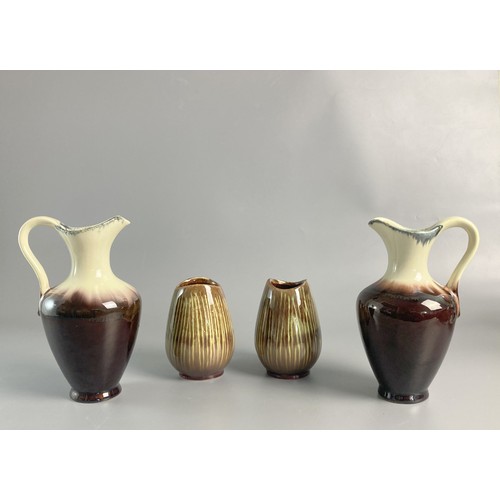 121 - Seven pieces of Retro West German pottery vases planter and Jugs.
Tallest 30cm