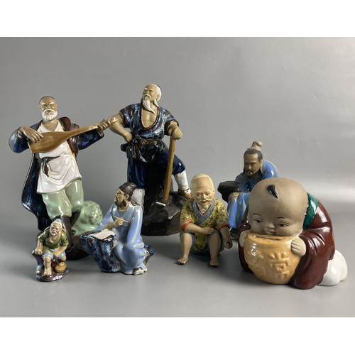 174 - Collection of seven vintage Chinese Mud Men figures.