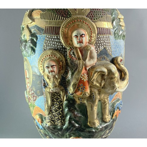 130 - Large Satsuma relief decorated vase. Hand painted relief figures with moriage design. Signed to base... 