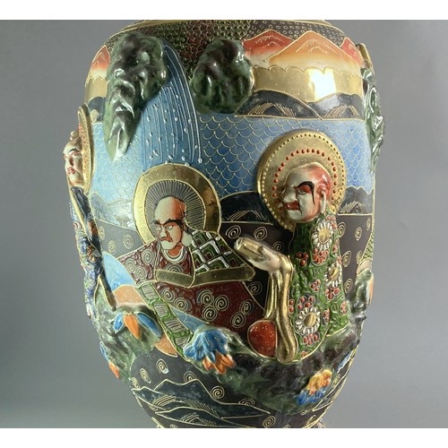 130 - Large Satsuma relief decorated vase. Hand painted relief figures with moriage design. Signed to base... 