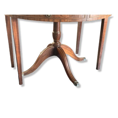 276 - 20th-century Mahogany round extending Drum table. (Missing leaves). With false drawers all around.