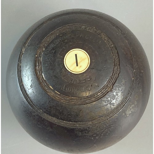 249 - Four antique Wooden Lawn Bowls.