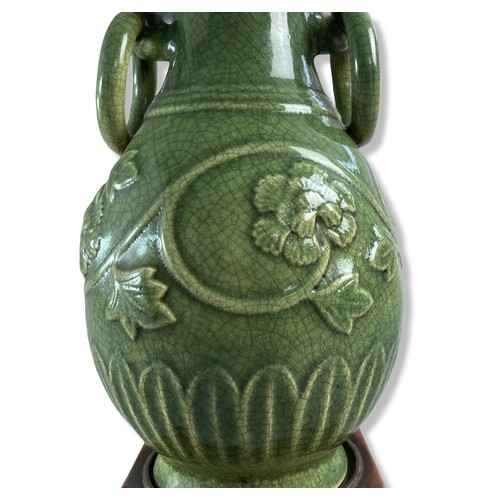 147 - Chinese Longquan Celadon porcelain table lamp vase. Relief decorated with scrolling floral motif. 
3... 