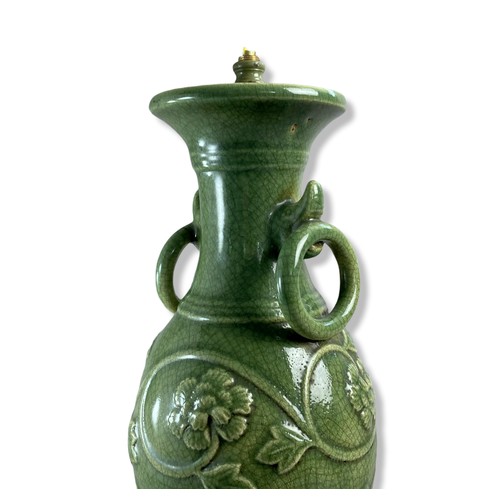 147 - Chinese Longquan Celadon porcelain table lamp vase. Relief decorated with scrolling floral motif. 
3... 