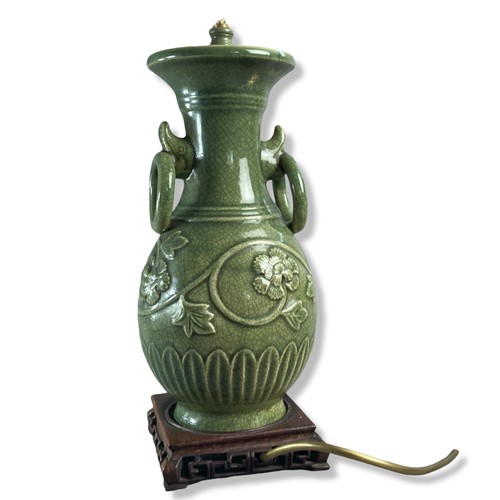 147 - Chinese Longquan Celadon porcelain table lamp vase. Relief decorated with scrolling floral motif. 
3... 