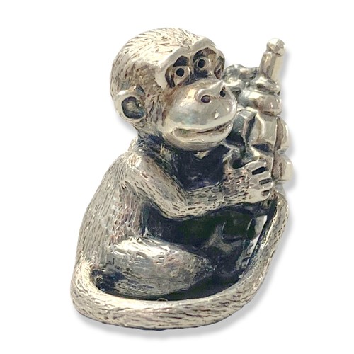 45 - A cast Silver Monkey holding grenade figure. Marked 925, with makers marks. 
Weighs Approx 62 grams.... 