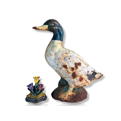 335 - Antique painted Cast Iron Duck door stop. Together with a smaller floral example.
Duck measures - 31... 