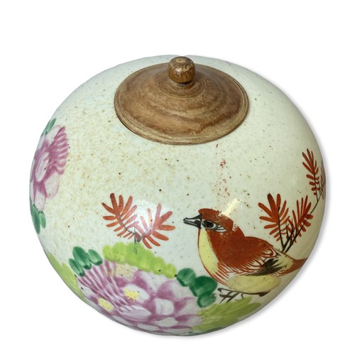 184 - A hand painted Chinese porcelain Jar & cover. Depicting a bird perched amongst enamel blossoming flo... 