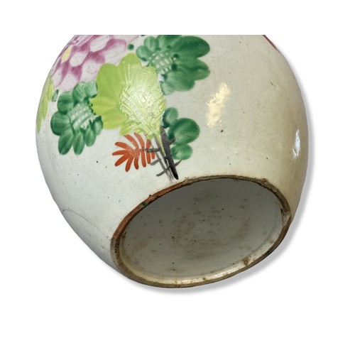 184 - A hand painted Chinese porcelain Jar & cover. Depicting a bird perched amongst enamel blossoming flo... 