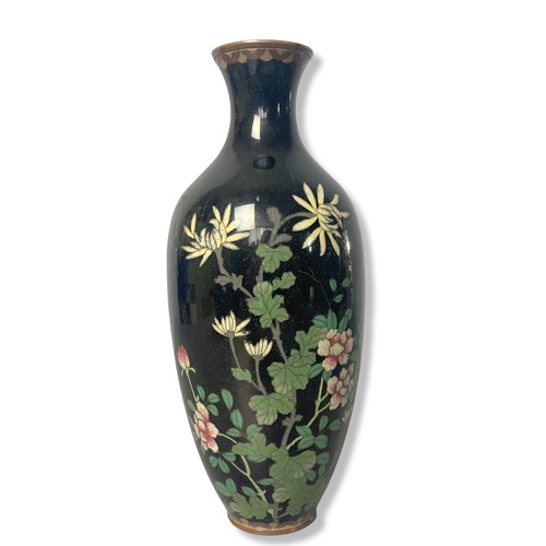 336 - A pair of Meiji period Japanese Cloisonne vases. A black ground with blossoming flowers.
20cm Tall