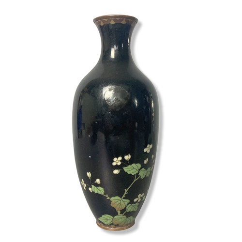 336 - A pair of Meiji period Japanese Cloisonne vases. A black ground with blossoming flowers.
20cm Tall