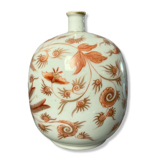 188 - A fine quality porcelain bottle vase painted in Iron red, depicting a rising Phoenix with stylised f... 