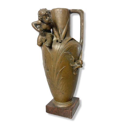 337 - Signed W. Herring Art Nouveau vase together with a Spelter 