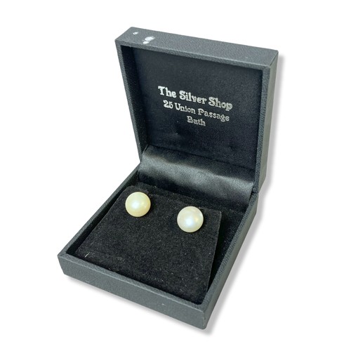 30 - A pair of pearl & silver earrings.