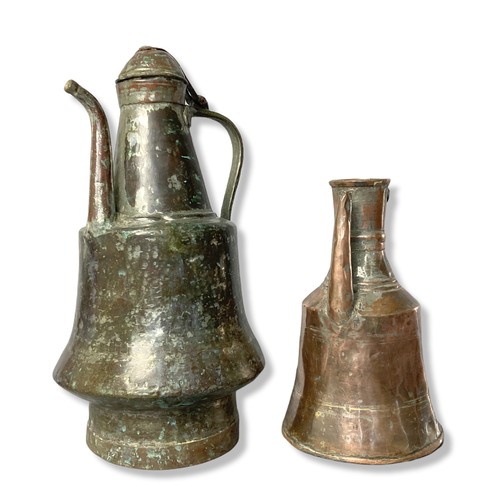 350 - A pair of middle Eastern brass Jugs.
Tallest - 37cm