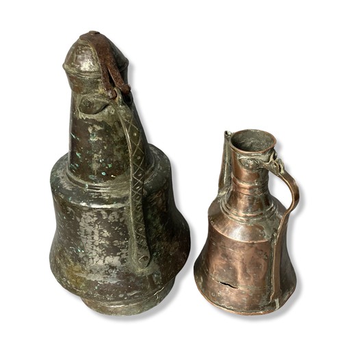 350 - A pair of middle Eastern brass Jugs.
Tallest - 37cm