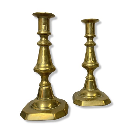 354 - A pair of Victorian Brass plunge candlesticks.
17cm