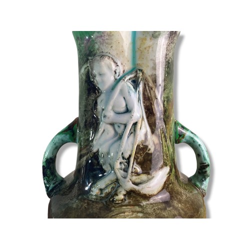 110C - Unusual Arabia (Finnish) style ceramic tri-handle vase. Relief decorated with a Faun.
26cm tall