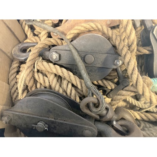 365A - A box of vintage heavy duty Ropes & Cast Iron Pulleys.