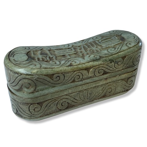 188 - A Chinese carved hardstone Pillow box. Carved with scrolling floral motif with script to centre. 
Me... 