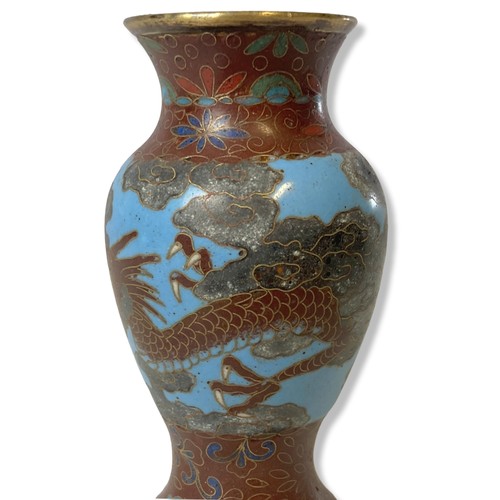 117 - A Meiji period Japanese Cloisonne Dragon decorated miniature vase. 
10.5cm Tall.