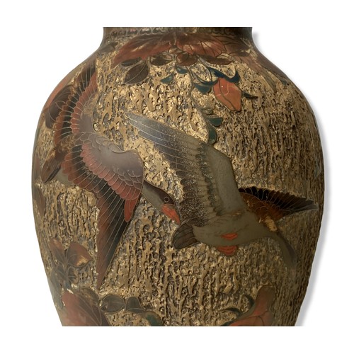 118 - A Japanese Totai Shippo (Tree bark) bark. On porcelain ground. Decorated with flying Geese amongst l... 