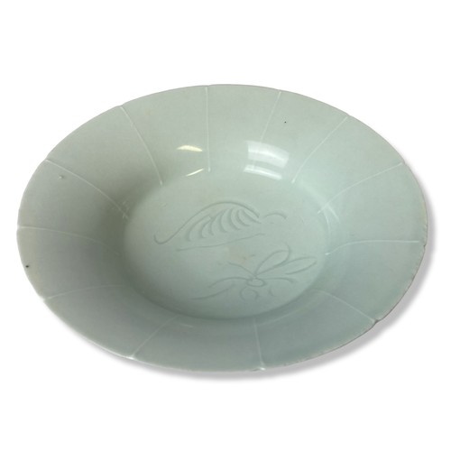 201 - A Chinese carved Qingbai type Celadon porcelain bowl. Carved floral Motifs. 
Measures 4.5 x 17.5cm