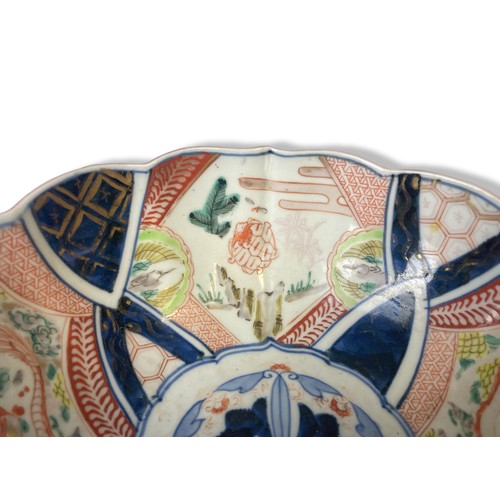 84 - A 19th-century Meiji period Japanese Arita Imari porcelain bowl. hand-painted panels depicting Drago... 