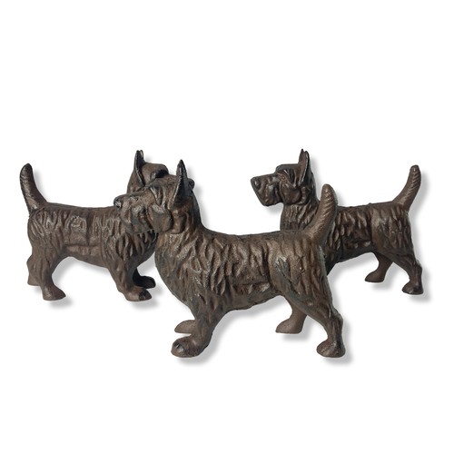 270 - Three vintage Cast Iron Scottish terrier figures.
 16 x 19 cm