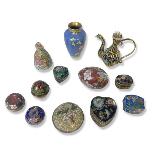 125 - A collection of Chinese Cloisonne. Including vase, ewer, egg, bell and trinket boxes. 12 in in total... 