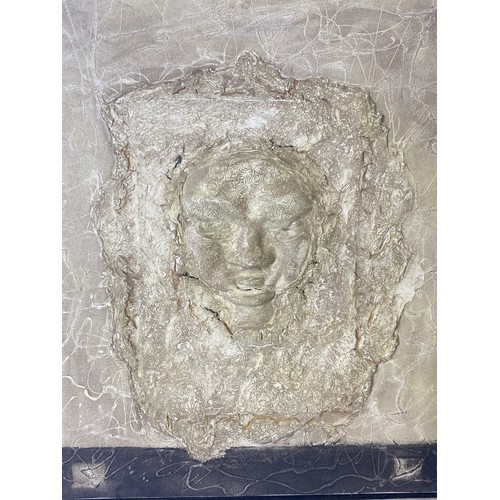 304 - Two unusual signed Oils on canvas. Depicting relief faces.
54 x 44 cm