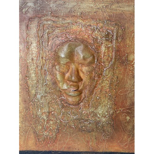 304 - Two unusual signed Oils on canvas. Depicting relief faces.
54 x 44 cm