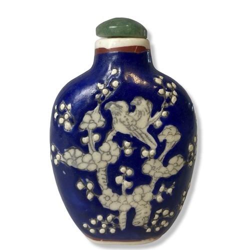 214 - Three Chinese porcelain hand painted snuff bottles.