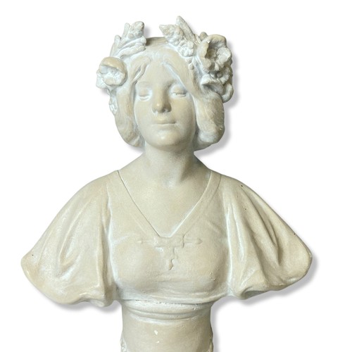 396 - A painted cast Plaster bust of a maiden.
34cm Tall