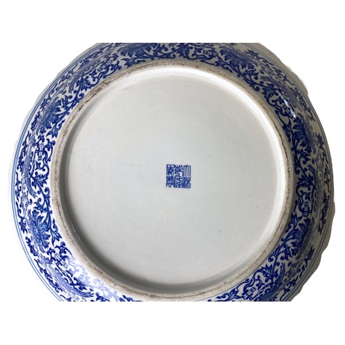 219 - A large Chinese porcelain 'One hundred Children' blue & white dish. Blue apocryphal Qianlong mark in... 