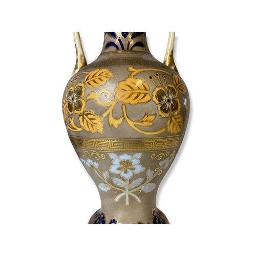 87 - Pair of Japanese Noritake porcelain vases. Decorated with stylised floral Motifs.
28.5cm Tall.