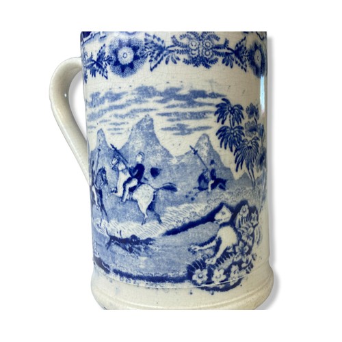 101 - An early 19th-century Staffordshire Pearlware blue & white transfer tankard. Decorated with an India... 