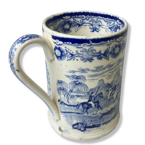 101 - An early 19th-century Staffordshire Pearlware blue & white transfer tankard. Decorated with an India... 