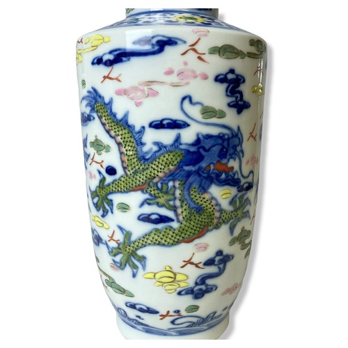 226 - A Chinese hand painted Rouleau shape Dragons vase. Depicting three pair of green scale Dragons and o... 