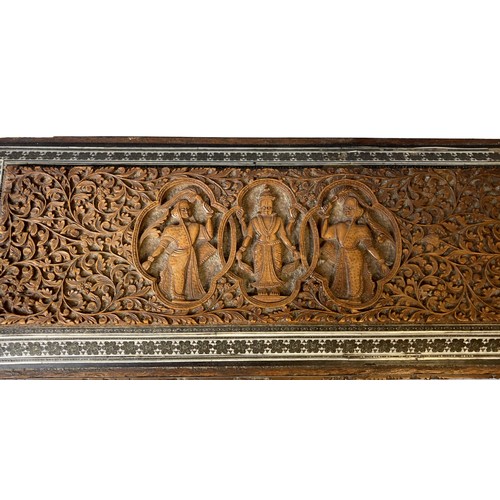 130 - An Anglo Indian carved Sandalwood & Sadeli ware box.  The cover carved with Lakshmi. Overall decorat... 