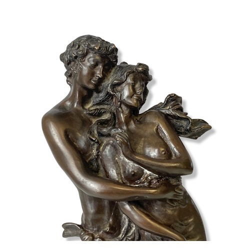 178 - A heavy solid Bronze sculpture of romantic couple. 
33cm Tall